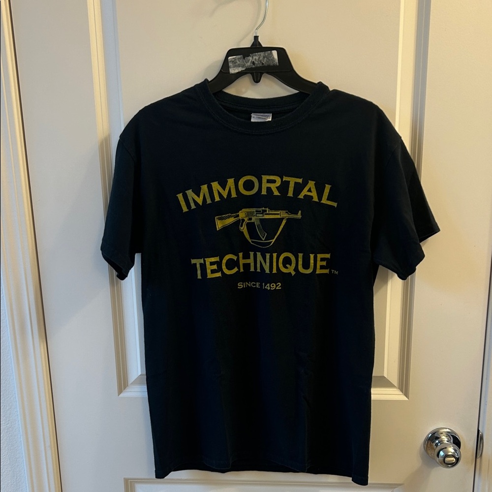 Immortal Technique Vintage Autographed shirt!